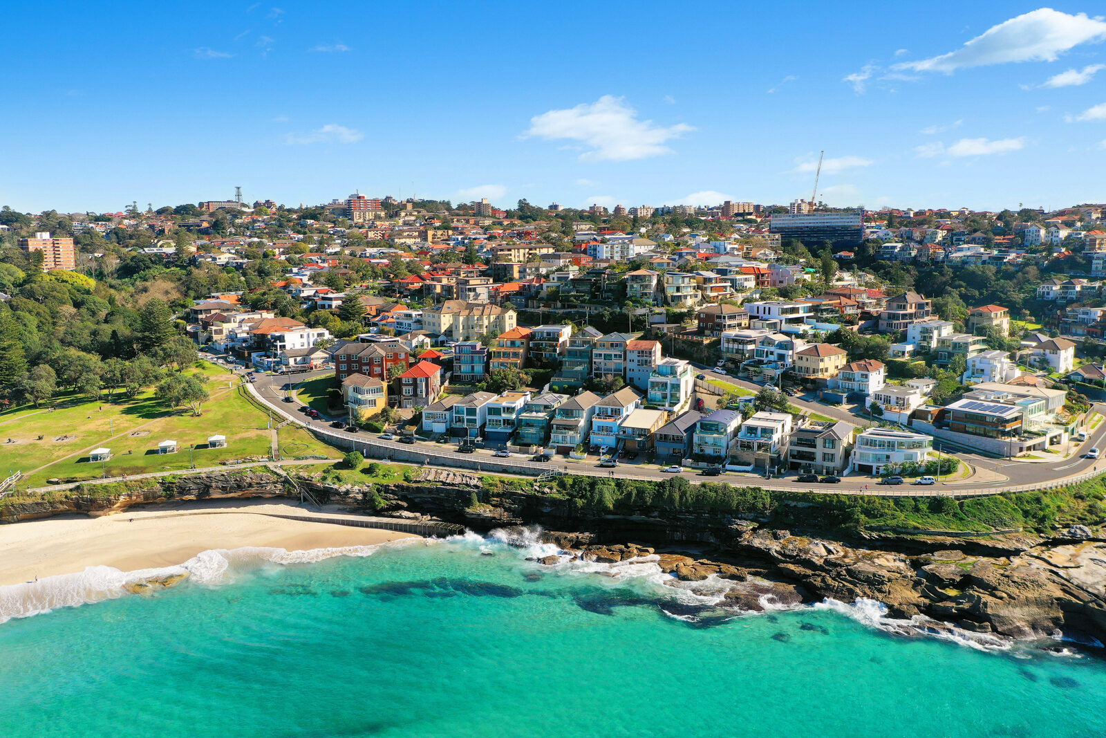 bronte beach sydney with houses and blue water