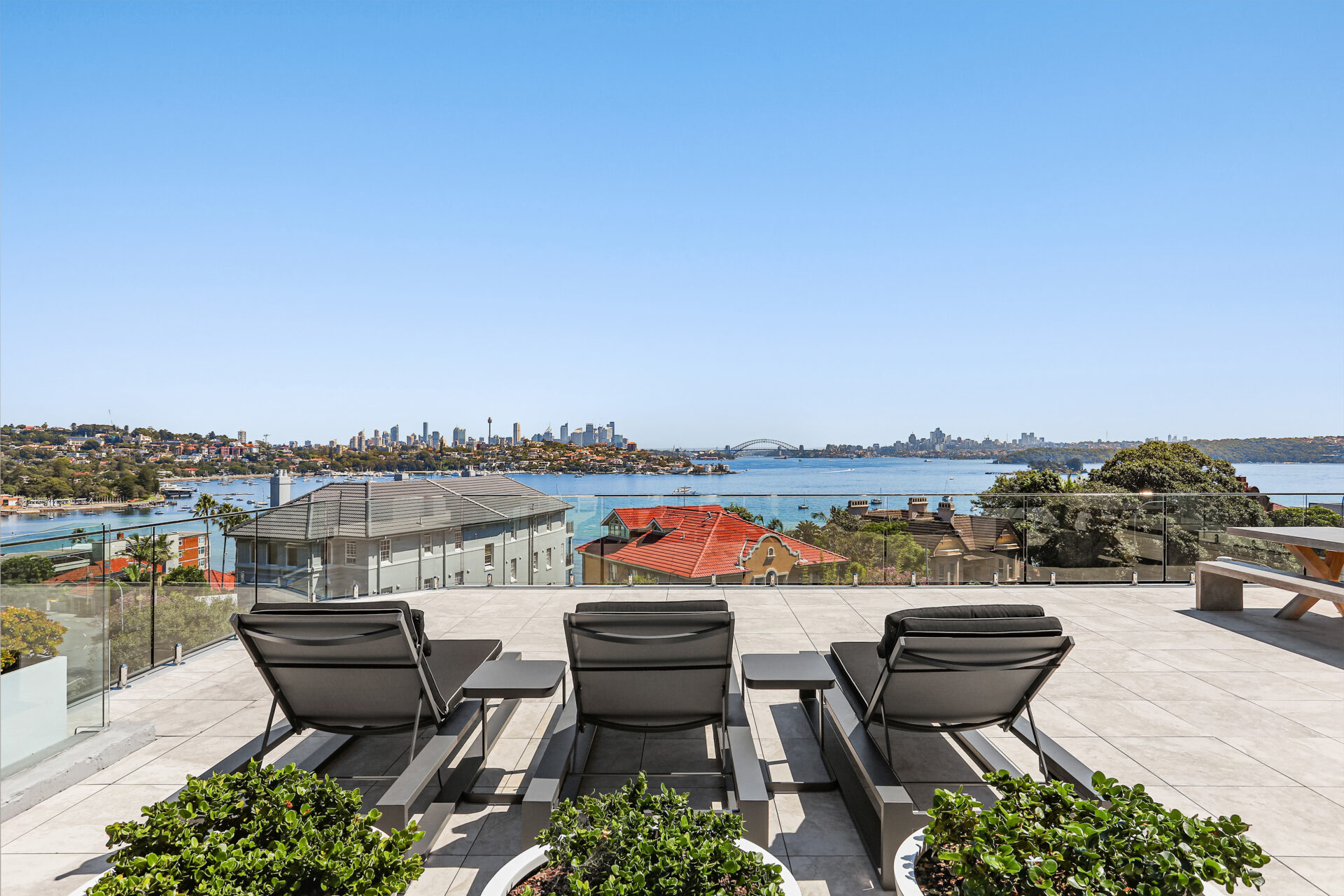 Million dollar penthouse with sunbeds over looking Sydney Harbour